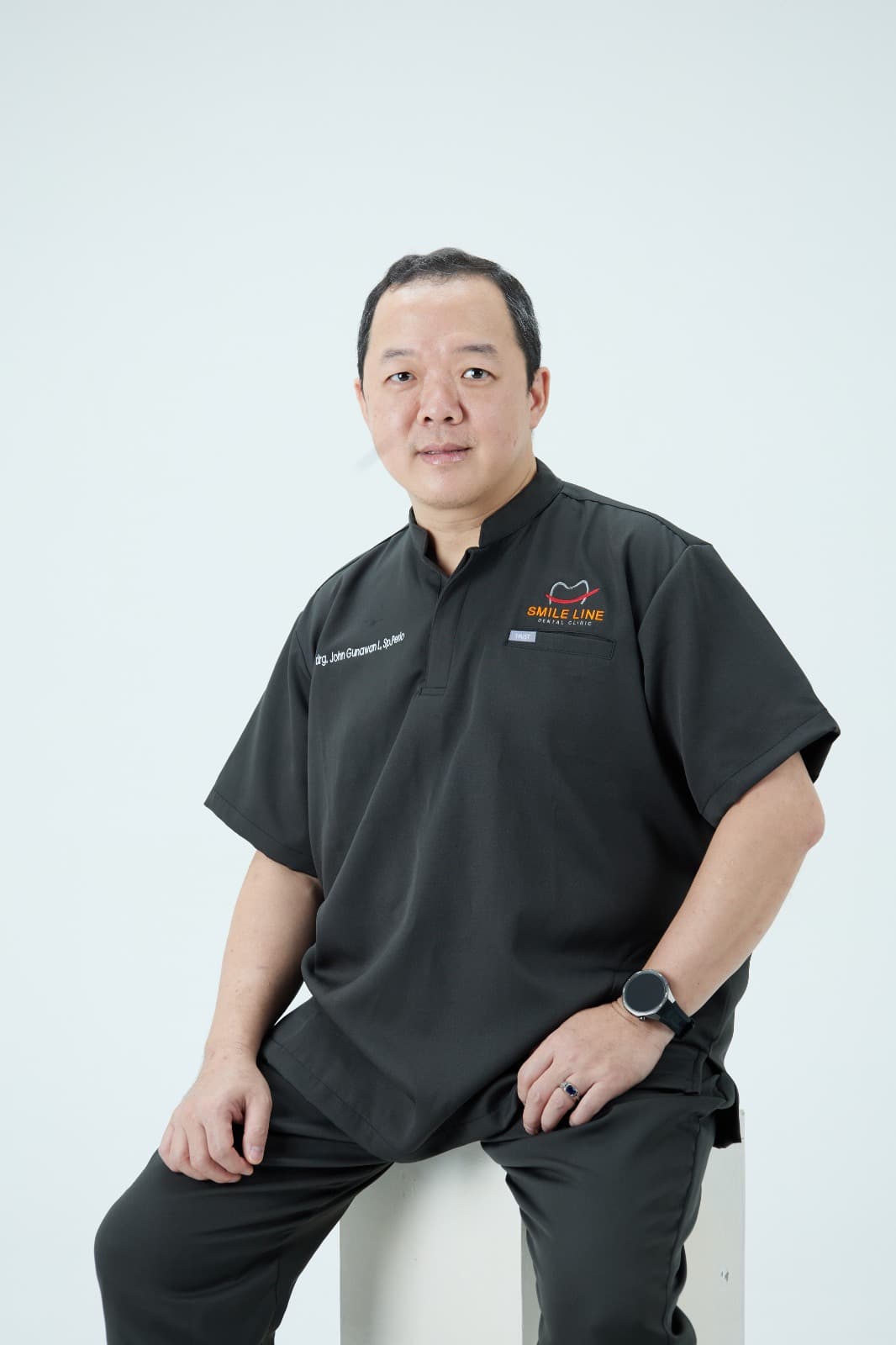 drg. John Gunawan Lusari, Sp. Perio